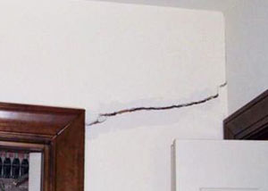 A large drywall crack in an interior wall in Marietta