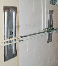 A foundation wall anchor system used to repair a basement wall in Woodstock